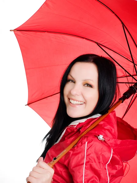 Smiling brunette woman in fall, rainproo — Stock Photo, Image