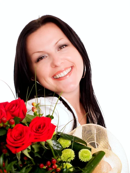 Smiling brunette woman with bouquet — Stock Photo, Image