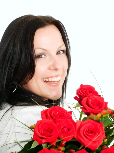 Smiling brunette woman with bouquet — Stock Photo, Image