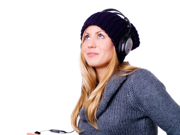 Uśmiechający się blond kobieta ze słuchawkami — Zdjęcie stockowe
