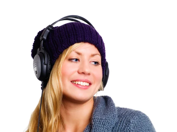 Adolescente sonriente con auriculares — Foto de Stock