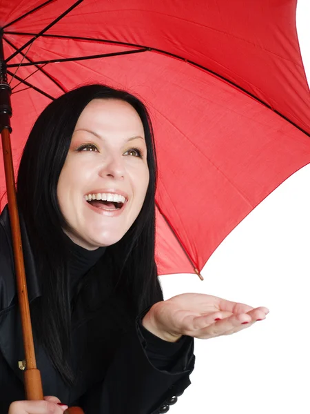 Smiling brunette woman with umbrella Stock Picture