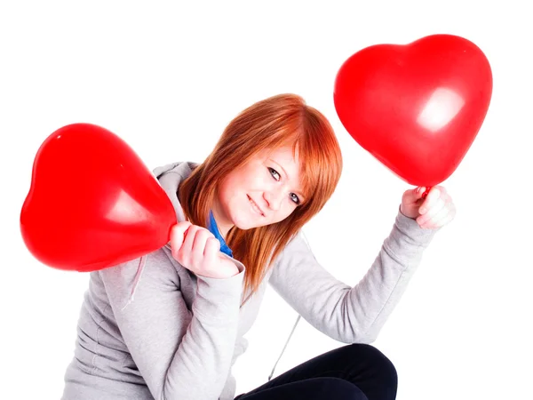 Dívka drží valetine balónek srdce — Stock fotografie