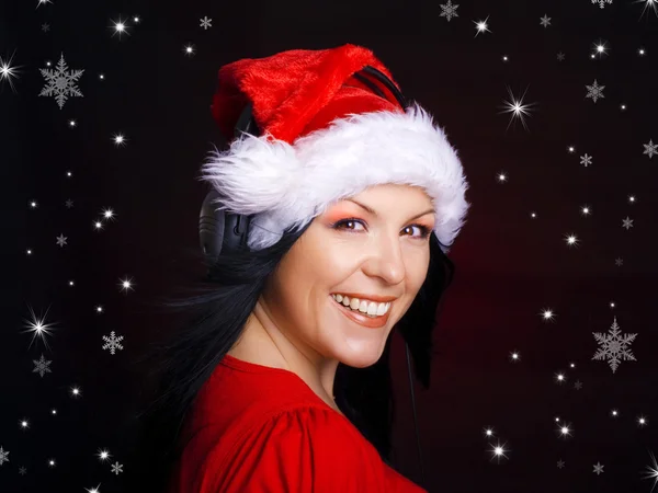 クリスマス サンタ帽子を持つ女性 — ストック写真