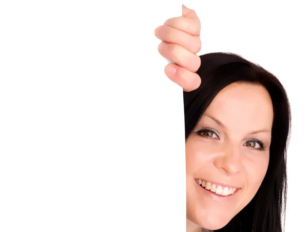 Smiling woman holding a blank billboard — Stock Photo, Image