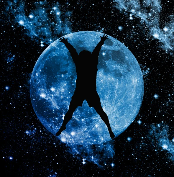 Abstracte menselijke silhouet op de maan — Stockfoto