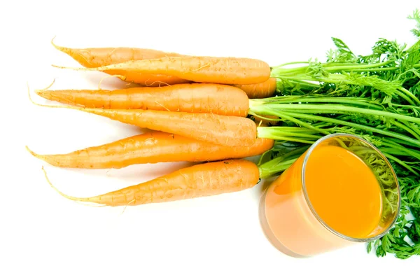 Помаранчева морква та сік — стокове фото