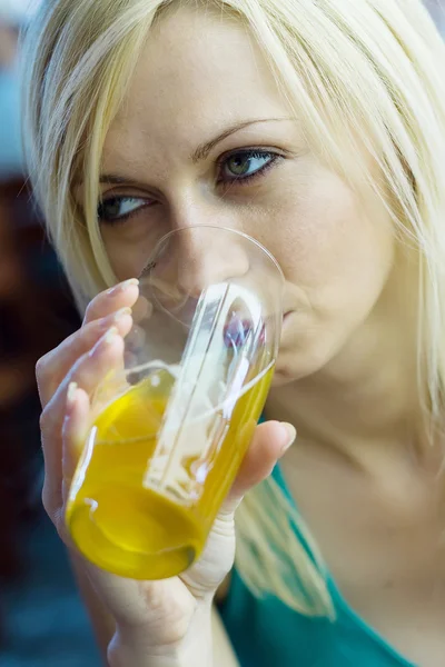 Young woman with beer — Stock Photo, Image