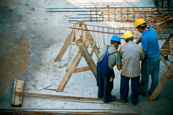 Trabajadores de la construcción Imagen de stock