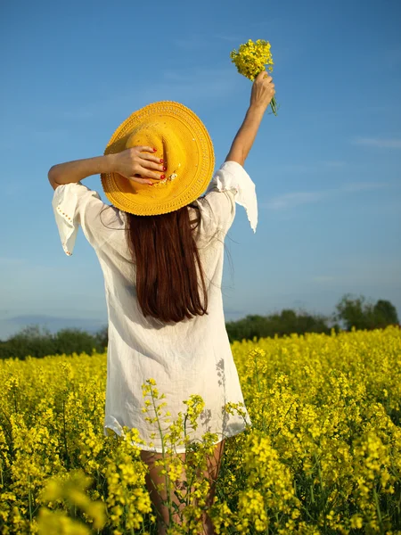 stock image Woman on field in bloom