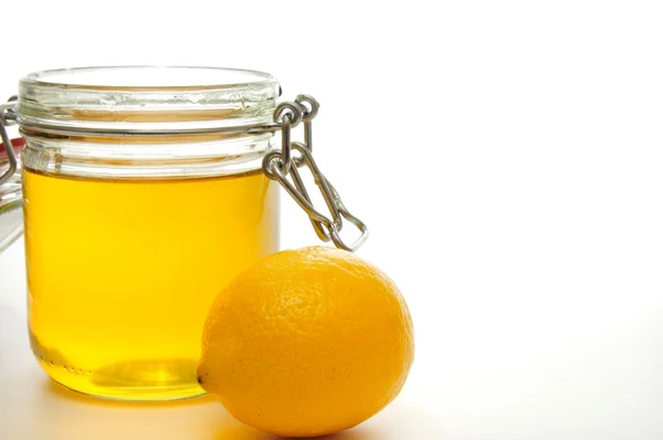 Méz jar és citrom — Stock Fotó