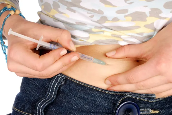 Инсулиновая инъекция — стоковое фото