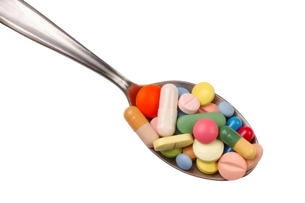 Pillole sul cucchiaio — Foto Stock