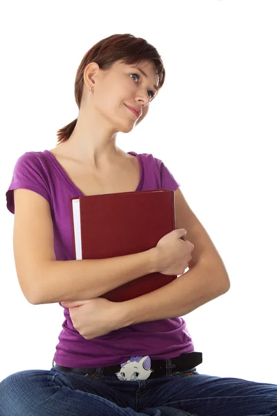 Young student holding a book — Stock Photo, Image