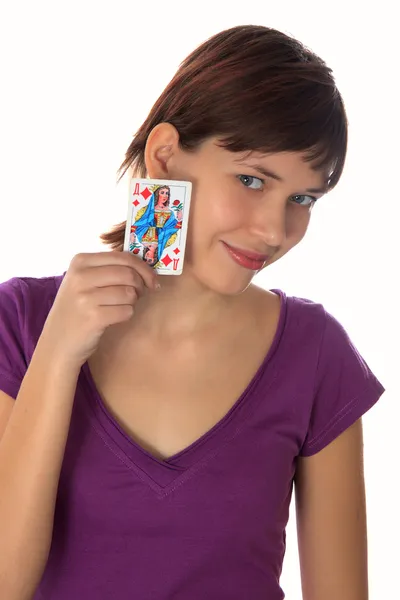 Giovane ragazza ha una carta da gioco — Foto Stock