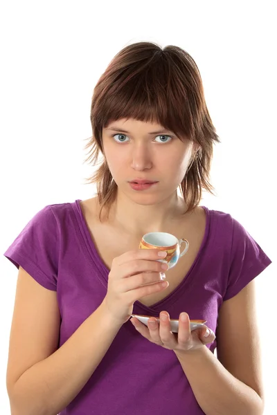 Girl with a cup in hands — Stock Photo, Image
