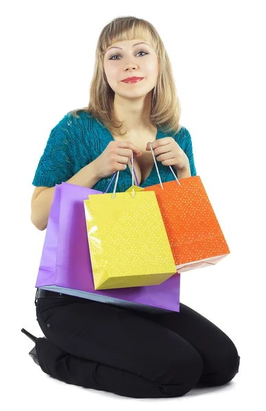 Beautiful girl holds packages — Stock Photo, Image