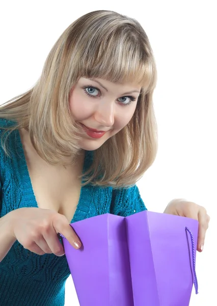 Beautiful girl holds packages Stock Image