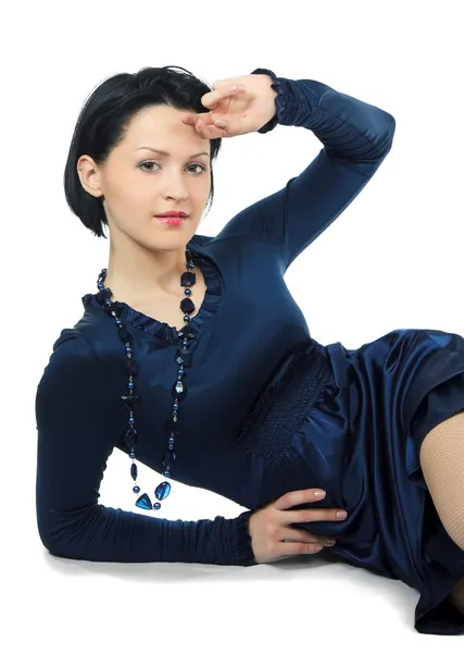 Menina bonita em vestido azul escuro — Fotografia de Stock