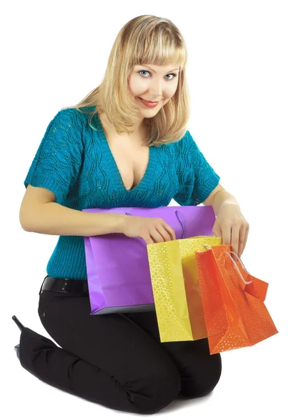 Beautiful woman holds packages — Stock Photo, Image