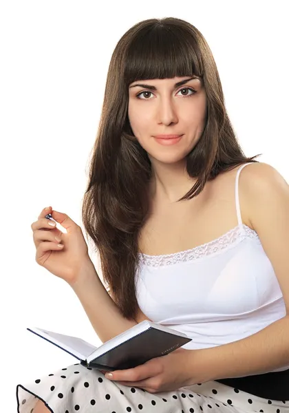 Nice girl with a diary — Stock Photo, Image