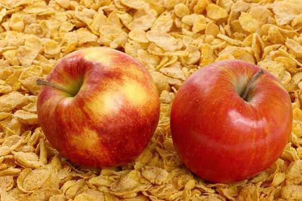 Apple and cornflakes — Stock Photo, Image