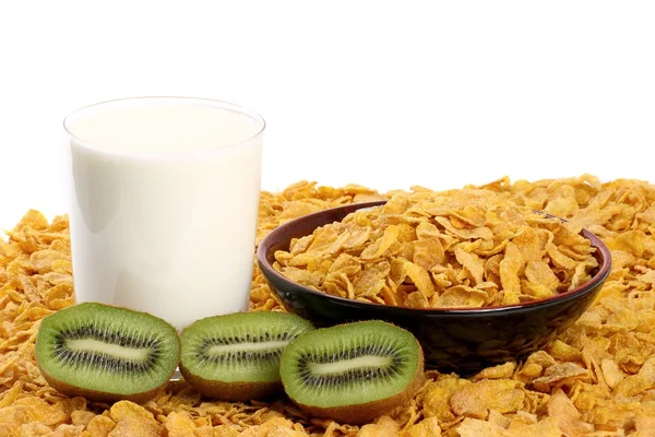 Mjölk, kiwi och cornflakes. — Stockfoto
