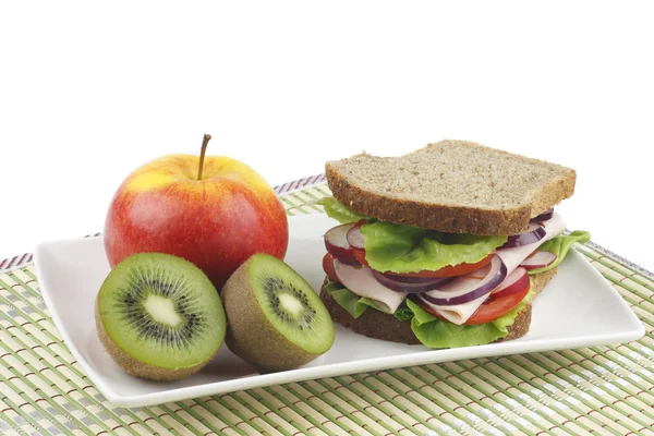 stock image Sandwich and fruit.