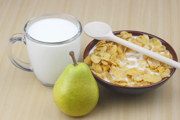 Päron, mjölk och cornflakes. — Stockfoto