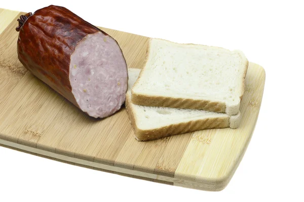 Sausage and bread. — Stock Photo, Image