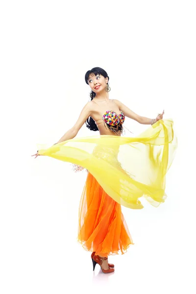 Belly dance with yellow fabric — Stock Photo, Image