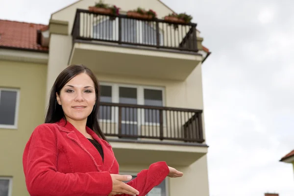 stock image Woman showing home