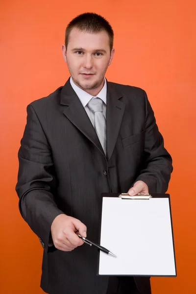Uomo d'affari con striscione — Foto Stock