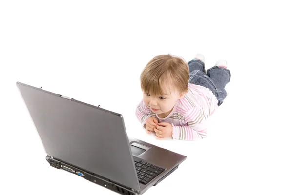 Дитина з ноутбуком — стокове фото