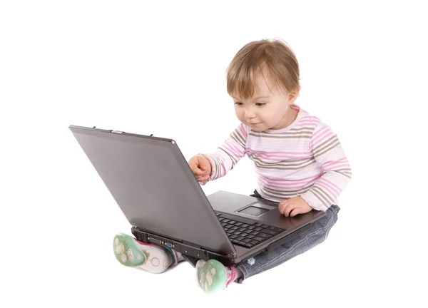 Bambino felice con computer portatile — Foto Stock