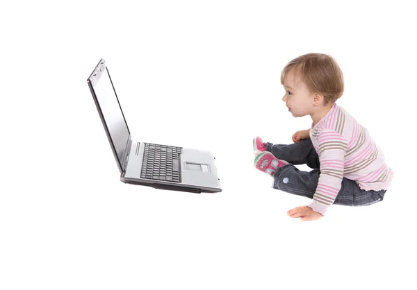 Bebé feliz con portátil —  Fotos de Stock