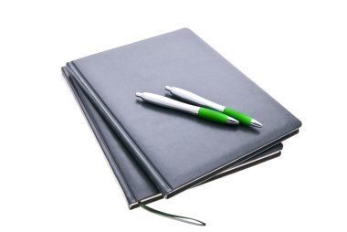 Netebooks and pens clipart