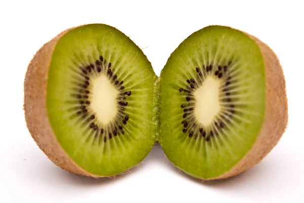 Kiwi divided into halves — Stock Photo, Image