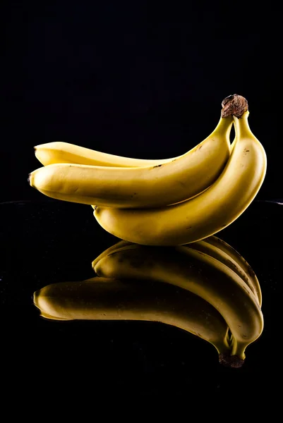 Bananas on black — Stock Photo, Image