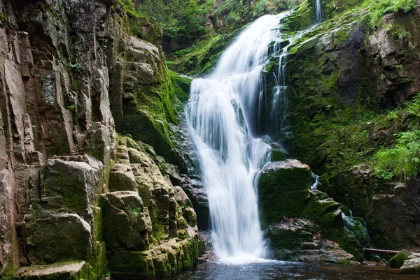 Waterfall in mountain Stock Photo