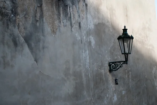 stock image Old street lamp on the wall