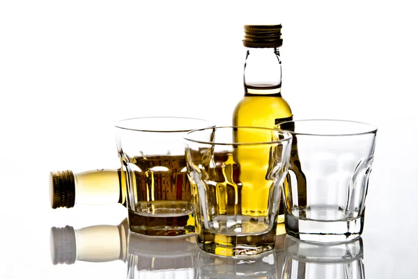 Shot glasses and bottles — Stock Photo, Image