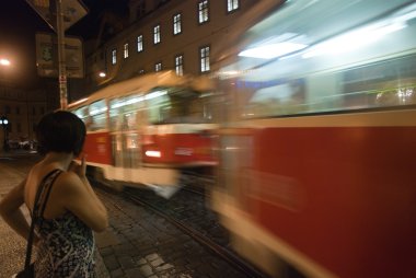 Tram on the night in the city clipart