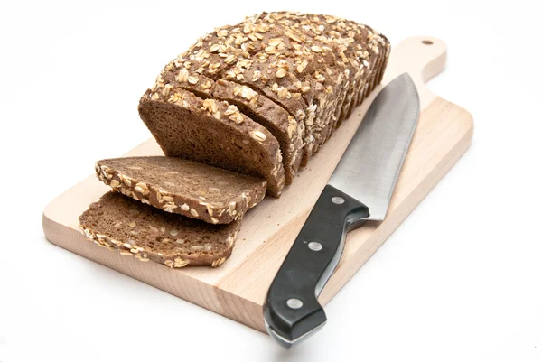 stock image Wholemeal bread on kitchen board