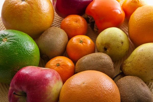 stock image Fruits orange apple kiwi kaki pear