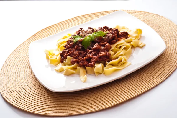 Spaghetti bolognese with cheese — Stock Photo, Image