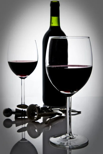 Botella de vino y gafas de vino Imagen de archivo