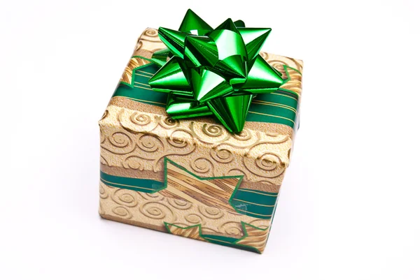 Christmas present with green bow — Stock Photo, Image