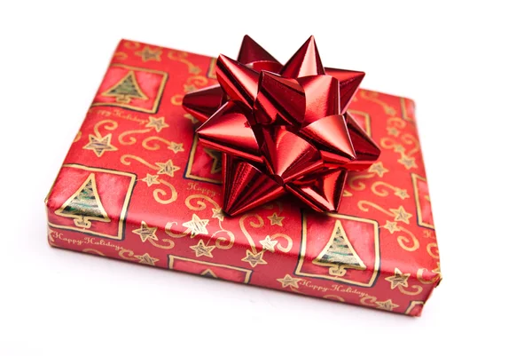 Christmas present with red bow — Stock Photo, Image
