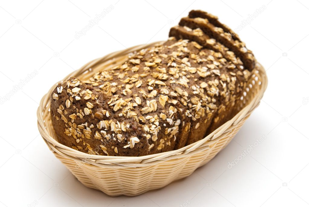Wholemeal bread in wicker basket Stock Photo by ©tarczas 1706576